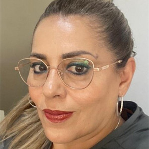 Dña. ALICIA